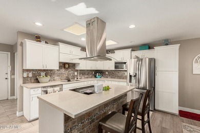 Curious to know what makes this AMAZING home truly EXCEPTIONAL on Sun City Lakes West and East in Arizona - for sale on GolfHomes.com, golf home, golf lot