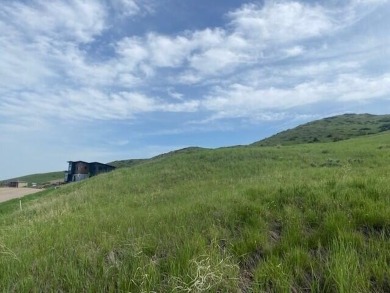 SWEEPING VIEWS of the Big Horn Mountains and The Powder Horn on The Powder Horn Golf Club - Mountain in Wyoming - for sale on GolfHomes.com, golf home, golf lot