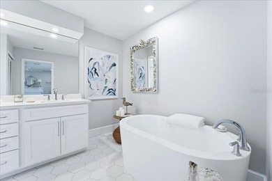 Move-in ready coastal home with extensive high-value upgrades on Rotonda Golf and Country Club The Links Course in Florida - for sale on GolfHomes.com, golf home, golf lot