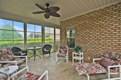 This home has it all! Curb appeal, low maintenance, attention to on Cape Fear National At Brunswick Forest in North Carolina - for sale on GolfHomes.com, golf home, golf lot