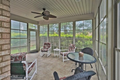This home has it all! Curb appeal, low maintenance, attention to on Cape Fear National At Brunswick Forest in North Carolina - for sale on GolfHomes.com, golf home, golf lot