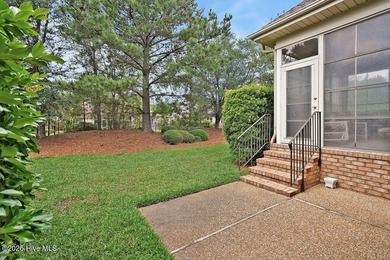 This home has it all! Curb appeal, low maintenance, attention to on Cape Fear National At Brunswick Forest in North Carolina - for sale on GolfHomes.com, golf home, golf lot