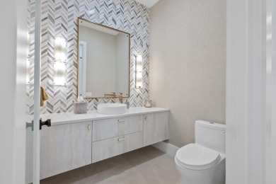 Modern refinement meets elegance in this exceptionally renovated on Boca Delray Golf and Country Club in Florida - for sale on GolfHomes.com, golf home, golf lot