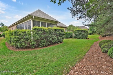 This home has it all! Curb appeal, low maintenance, attention to on Cape Fear National At Brunswick Forest in North Carolina - for sale on GolfHomes.com, golf home, golf lot