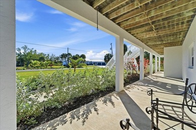 Move-in ready coastal home with extensive high-value upgrades on Rotonda Golf and Country Club The Links Course in Florida - for sale on GolfHomes.com, golf home, golf lot