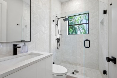 Modern refinement meets elegance in this exceptionally renovated on Boca Delray Golf and Country Club in Florida - for sale on GolfHomes.com, golf home, golf lot