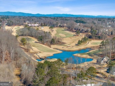 Welcome to your completely renovated haven in coveted Woodmont on Woodmont Golf and Country Club in Georgia - for sale on GolfHomes.com, golf home, golf lot