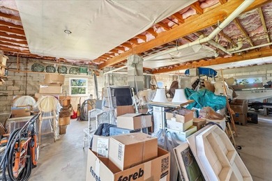 Move-in ready coastal home with extensive high-value upgrades on Rotonda Golf and Country Club The Links Course in Florida - for sale on GolfHomes.com, golf home, golf lot