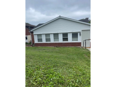 NEWLY UPDATED WITH LOADS OF CHARM AND CLOSE TO ALL AMENITIES on Bluefield Elks Club in West Virginia - for sale on GolfHomes.com, golf home, golf lot