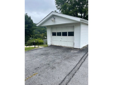 NEWLY UPDATED WITH LOADS OF CHARM AND CLOSE TO ALL AMENITIES on Bluefield Elks Club in West Virginia - for sale on GolfHomes.com, golf home, golf lot