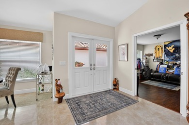 This beautifully renovated and meticulous 3BR/3BA pool home with on  in Florida - for sale on GolfHomes.com, golf home, golf lot