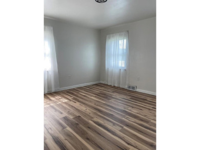 NEWLY UPDATED WITH LOADS OF CHARM AND CLOSE TO ALL AMENITIES on Bluefield Elks Club in West Virginia - for sale on GolfHomes.com, golf home, golf lot