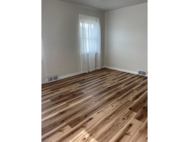 NEWLY UPDATED WITH LOADS OF CHARM AND CLOSE TO ALL AMENITIES on Bluefield Elks Club in West Virginia - for sale on GolfHomes.com, golf home, golf lot