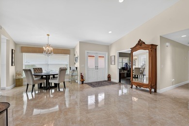 This beautifully renovated and meticulous 3BR/3BA pool home with on  in Florida - for sale on GolfHomes.com, golf home, golf lot