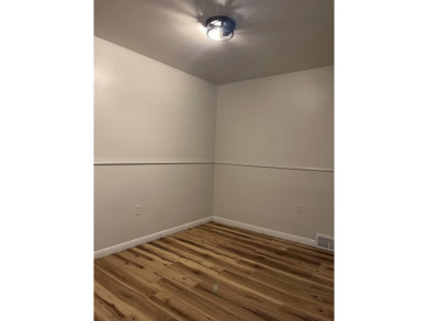 NEWLY UPDATED WITH LOADS OF CHARM AND CLOSE TO ALL AMENITIES on Bluefield Elks Club in West Virginia - for sale on GolfHomes.com, golf home, golf lot