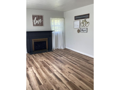 NEWLY UPDATED WITH LOADS OF CHARM AND CLOSE TO ALL AMENITIES on Bluefield Elks Club in West Virginia - for sale on GolfHomes.com, golf home, golf lot