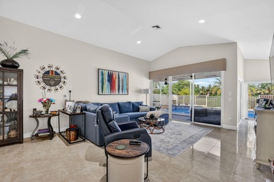 This beautifully renovated and meticulous 3BR/3BA pool home with on  in Florida - for sale on GolfHomes.com, golf home, golf lot