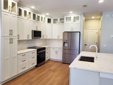Fully Renovated 5 Bed 3 Bath 3 Car Garage Home Features Direct on Rock Springs Ridge Golf Club in Florida - for sale on GolfHomes.com, golf home, golf lot