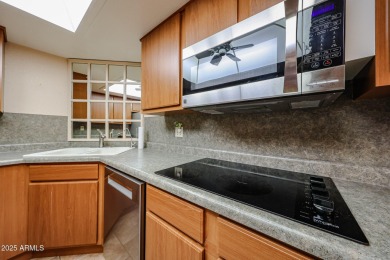 Sought-after ''D'' Model - this spacious third-floor condo on Sun City-Willow Creek / Willow Brook  in Arizona - for sale on GolfHomes.com, golf home, golf lot