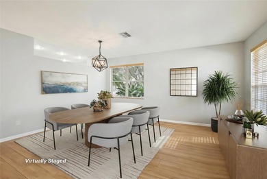 An EXCEPTIONAL VALUE in one of New Tampa's most sought-after on Hunters Green Country Club in Florida - for sale on GolfHomes.com, golf home, golf lot