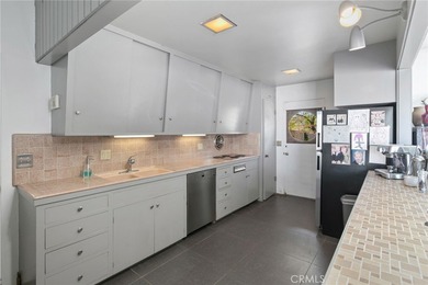 This private resort-like property is an oasis of mid-century on Rams Hill Golf Club in California - for sale on GolfHomes.com, golf home, golf lot