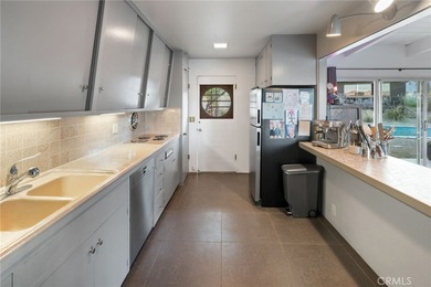 This private resort-like property is an oasis of mid-century on Rams Hill Golf Club in California - for sale on GolfHomes.com, golf home, golf lot
