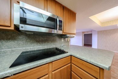 Sought-after ''D'' Model - this spacious third-floor condo on Sun City-Willow Creek / Willow Brook  in Arizona - for sale on GolfHomes.com, golf home, golf lot