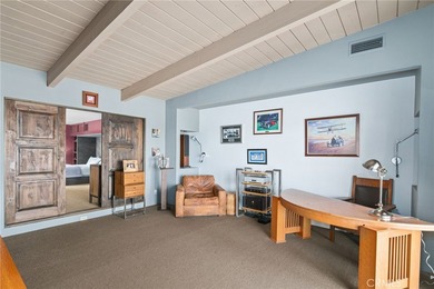 This private resort-like property is an oasis of mid-century on Rams Hill Golf Club in California - for sale on GolfHomes.com, golf home, golf lot