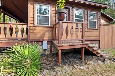 Charming 3 bedroom, 2 bath cedar sided, cul-de-sac home located on Holly Lake Ranch Golf Club in Texas - for sale on GolfHomes.com, golf home, golf lot