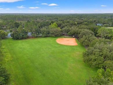 Under contract-accepting backup offers. An EXCEPTIONAL VALUE in on Hunters Green Country Club in Florida - for sale on GolfHomes.com, golf home, golf lot
