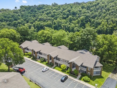 Located on the scenic shores of Lake Taneycomo, this fully on Pointe Royale Village Country Club in Missouri - for sale on GolfHomes.com, golf home, golf lot
