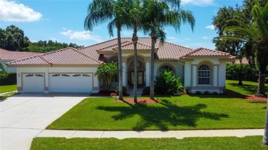 PARADISE Awaits in this SPECTACULAR WATERFRONT Home Located in on Crescent Oaks Country Club in Florida - for sale on GolfHomes.com, golf home, golf lot