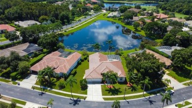 PARADISE Awaits in this SPECTACULAR WATERFRONT Home Located in on Crescent Oaks Country Club in Florida - for sale on GolfHomes.com, golf home, golf lot