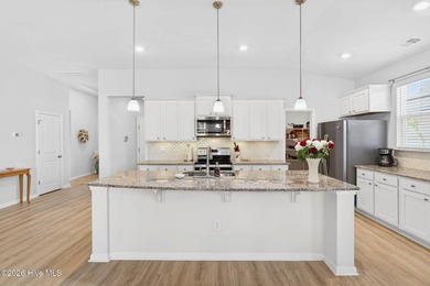 Living is easy in this Nearly New Tasteful Open-Concept on Brunswick Plantation and Golf Resorts in North Carolina - for sale on GolfHomes.com, golf home, golf lot