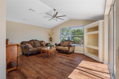 Nestled in a highly sought-after executive golf course community on Pinemoor West Golf Club in Florida - for sale on GolfHomes.com, golf home, golf lot