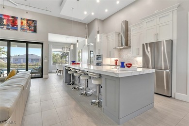 Discover modern coastal living in this Beautiful custom Home on Burnt Store Golf Club in Florida - for sale on GolfHomes.com, golf home, golf lot