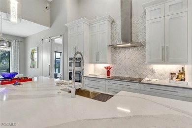 Discover modern coastal living in this Beautiful custom Home on Burnt Store Golf Club in Florida - for sale on GolfHomes.com, golf home, golf lot
