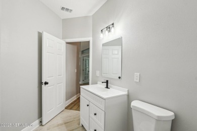 Welcome to this beautifully renovated 5-bedroom, 3.5-bathroom on Cimarrone Golf and Country Club in Florida - for sale on GolfHomes.com, golf home, golf lot