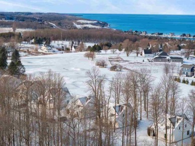 Offering Lake Michigan views, this fully furnished charming on Crooked Tree Golf Club in Michigan - for sale on GolfHomes.com, golf home, golf lot