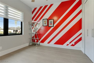 Discover modern coastal living in this Beautiful custom Home on Burnt Store Golf Club in Florida - for sale on GolfHomes.com, golf home, golf lot