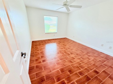 Buy this Wisteria Designer Home in this wonderful location on Truman Executive Golf Course in Florida - for sale on GolfHomes.com, golf home, golf lot