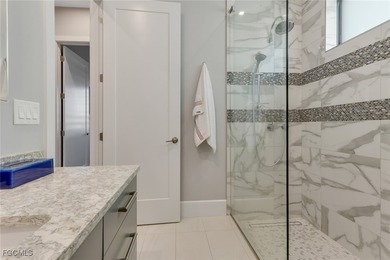 Discover modern coastal living in this Beautiful custom Home on Burnt Store Golf Club in Florida - for sale on GolfHomes.com, golf home, golf lot