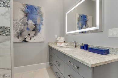 Discover modern coastal living in this Beautiful custom Home on Burnt Store Golf Club in Florida - for sale on GolfHomes.com, golf home, golf lot