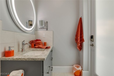 Discover modern coastal living in this Beautiful custom Home on Burnt Store Golf Club in Florida - for sale on GolfHomes.com, golf home, golf lot