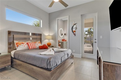 Discover modern coastal living in this Beautiful custom Home on Burnt Store Golf Club in Florida - for sale on GolfHomes.com, golf home, golf lot