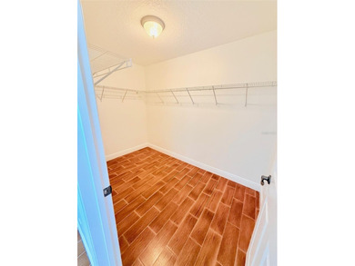 Buy this Wisteria Designer Home in this wonderful location on Truman Executive Golf Course in Florida - for sale on GolfHomes.com, golf home, golf lot