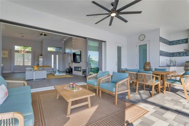 Discover modern coastal living in this Beautiful custom Home on Burnt Store Golf Club in Florida - for sale on GolfHomes.com, golf home, golf lot