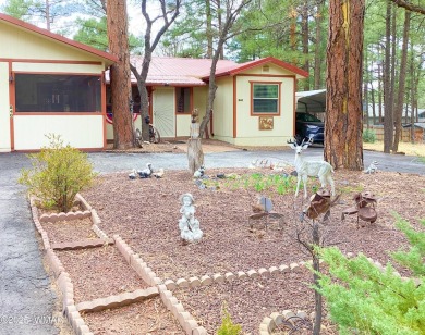 Nestled in the serene Fairway Park community, this delightful on Bison Golf and Country Club in Arizona - for sale on GolfHomes.com, golf home, golf lot