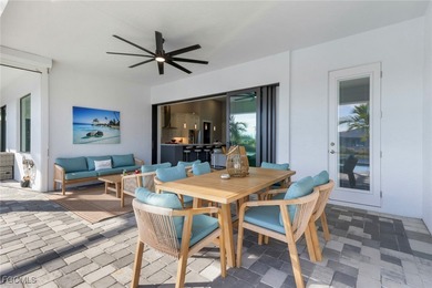 Discover modern coastal living in this Beautiful custom Home on Burnt Store Golf Club in Florida - for sale on GolfHomes.com, golf home, golf lot