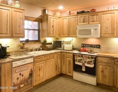Nestled in the serene Fairway Park community, this delightful on Bison Golf and Country Club in Arizona - for sale on GolfHomes.com, golf home, golf lot